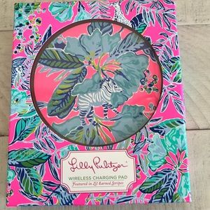 NIB wireless charging pad. Lil Earned Stripes.